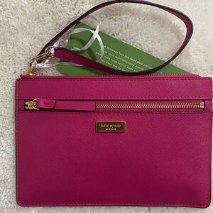 Kate Spade Sweetheart Pink Laurel Way Tinie Wristlet made from leather